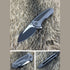 GUNMANSA We Knife 717G Gray Ti Handle With CF Inlay Black Stonewash, Satin Blade Knife